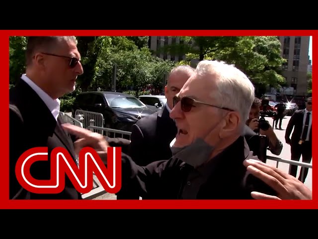 ⁣Robert De Niro clashes with Trump supporters outside courthouse