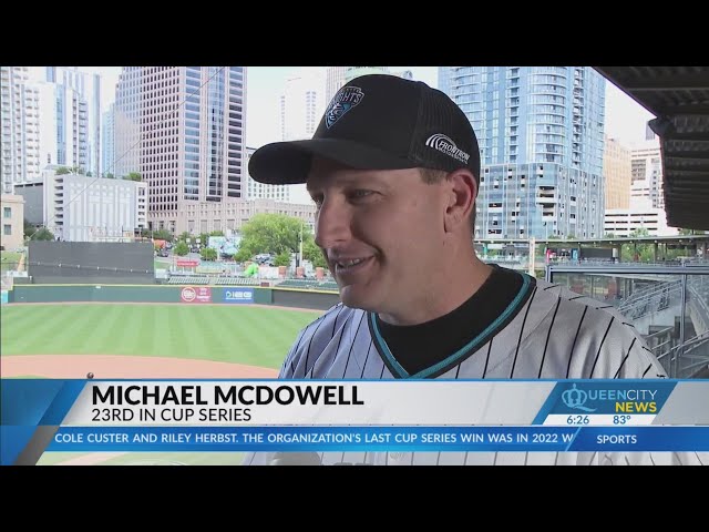 ⁣NASCAR driver throws out first pitch at Charlotte Knights
