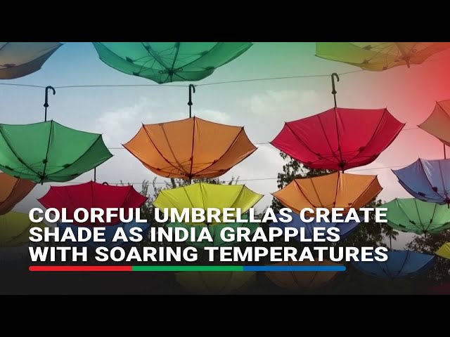 ⁣Colorful umbrellas create shade as India grapples with soaring temperatures