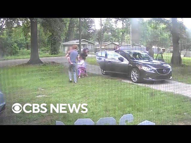 ⁣Video shows family being carjacked in their own driveway with children inside car in Mississippi