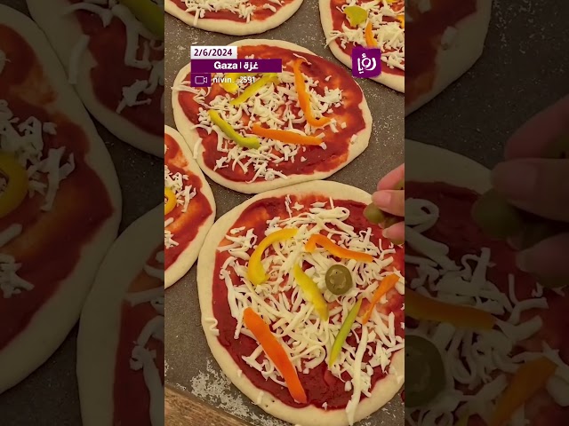 ⁣صنع بيتزا بفرن الطين من وسط القطاع