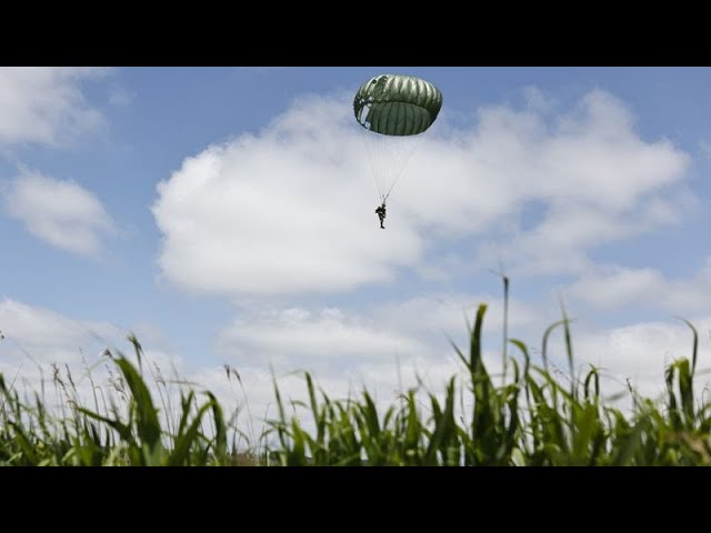 ⁣Mass parachute jump over Normandy kicks off D-Day commemorations - but Putin is not invited