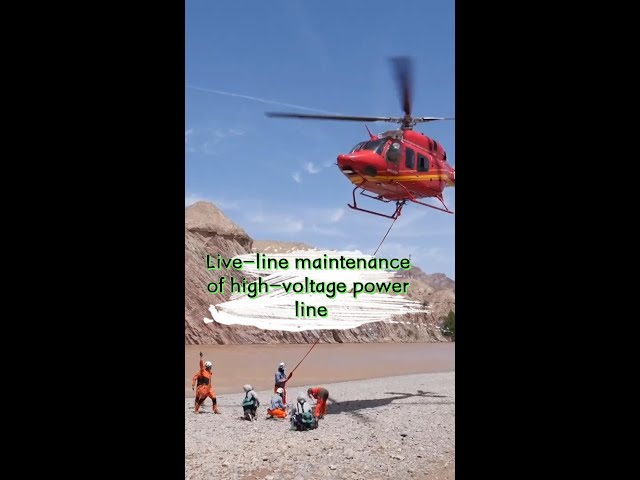 ⁣Helicopters help with high-voltage power line maintenance