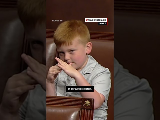 ⁣Congressman's son pulls funny faces behind dad during House floor speech