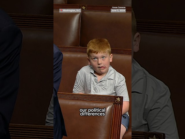 ⁣Congressman's son caught makes funny faces during his dad's speech