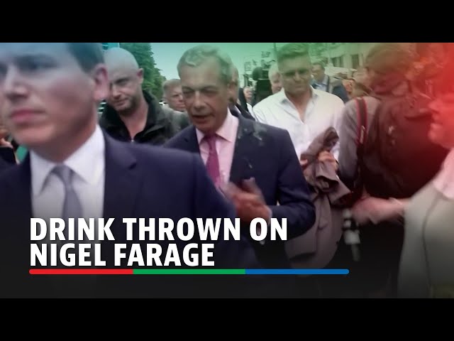 ⁣WATCH: Drink thrown on Reform Party candidate Nigel Farage | ABS-CBN News