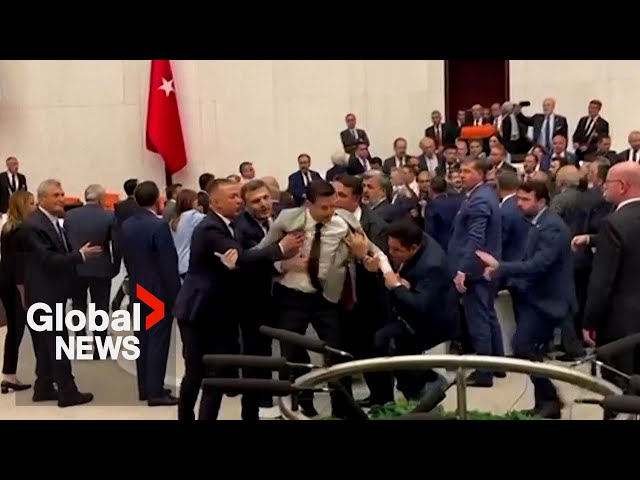 ⁣Lawmakers brawl in Turkish parliament over pro-Kurdish mayor's detention