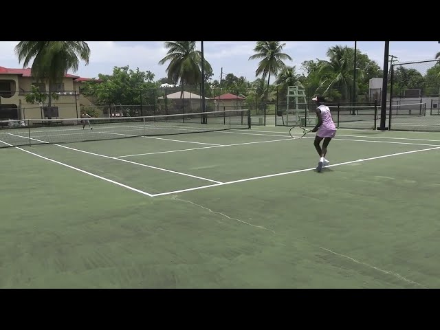 ENTHRALLING ACTION IN JUNIOR TENNIS TOURNAMENT