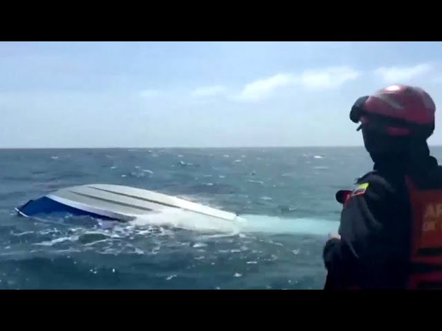 ⁣WATCH: Four passengers rescued from capsized boat in Colombia