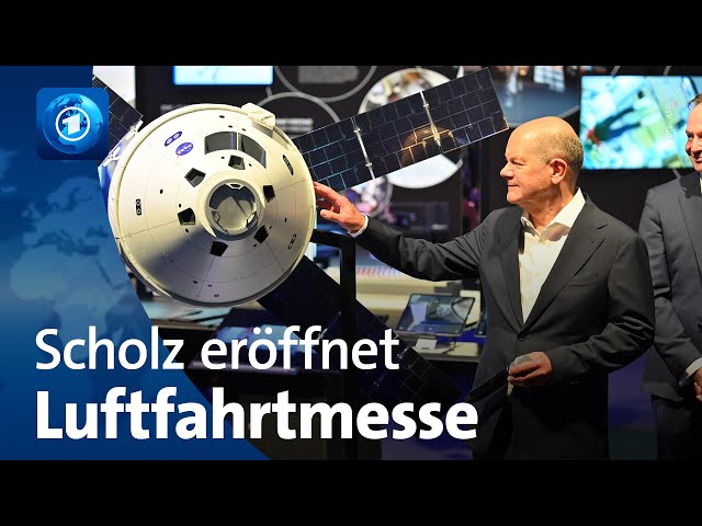 ⁣Luft- und Raumfahrtausstellung (ILA) in Berlin eröffnet: Kanzler Scholz gibt Branche Rückendeckung