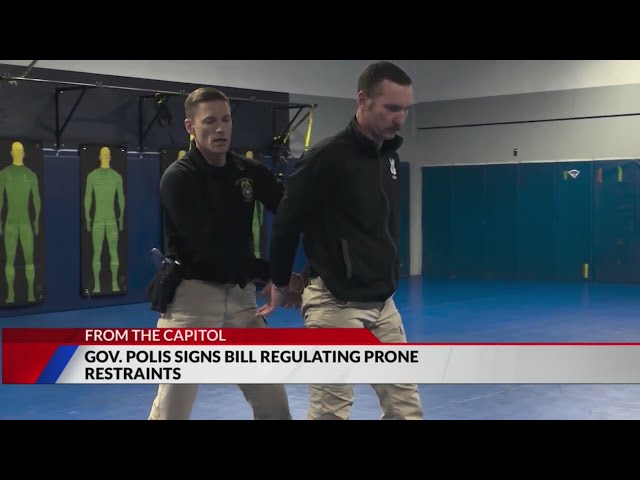 ⁣Polis signs prone restraint bill