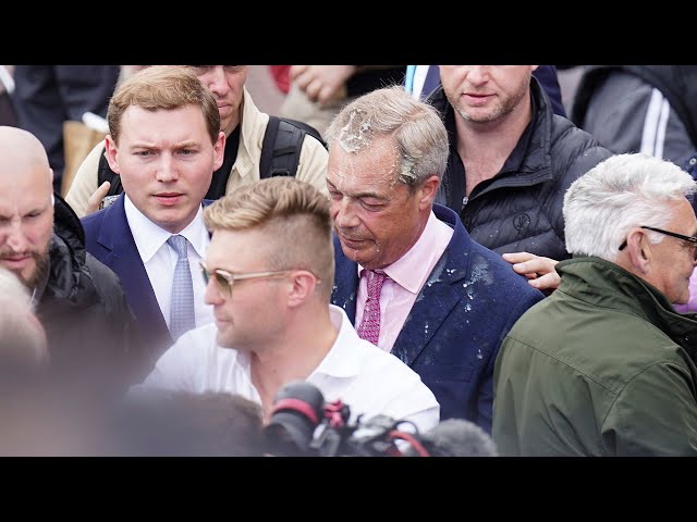⁣U.K. right-wing leader Nigel Farage hit with milkshake