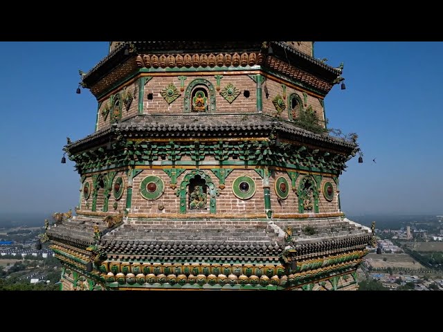 ⁣Exploring world's tallest colorful glazed pagoda in N China