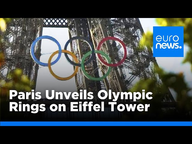 ⁣Paris Prepares for 2024 Olympics with Eiffel Tower Display | euronews Ol