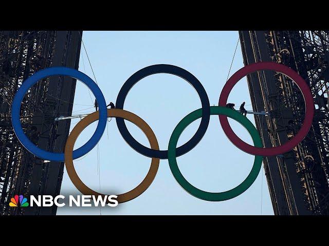 ⁣Olympic rings installed on Eiffel Tower to mark 50 days to start of the Paris Games