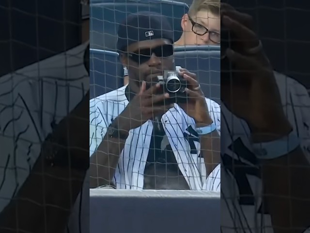 ⁣Julius Randle Taking Polaroids At The Yankees Game 