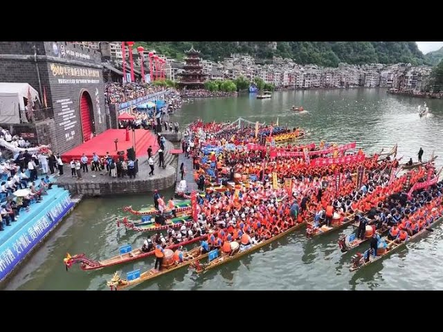 ⁣Dragon boat race in China's Guizhou infuses Dragon Boat Festival with joy