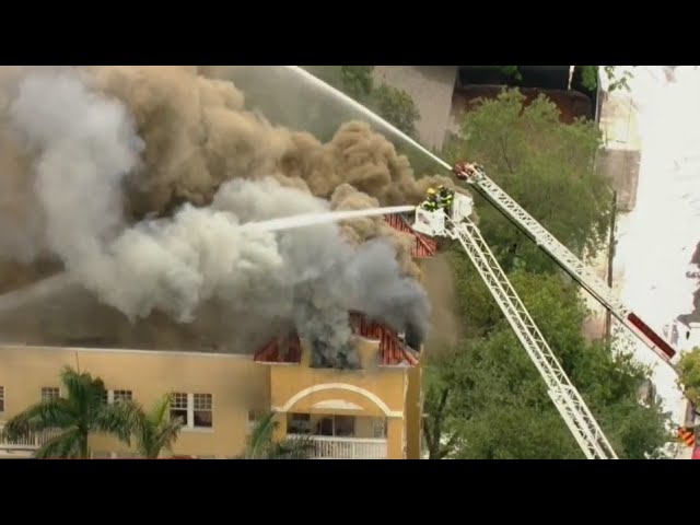 Massive fire at Miami apartment building where a man was found shot