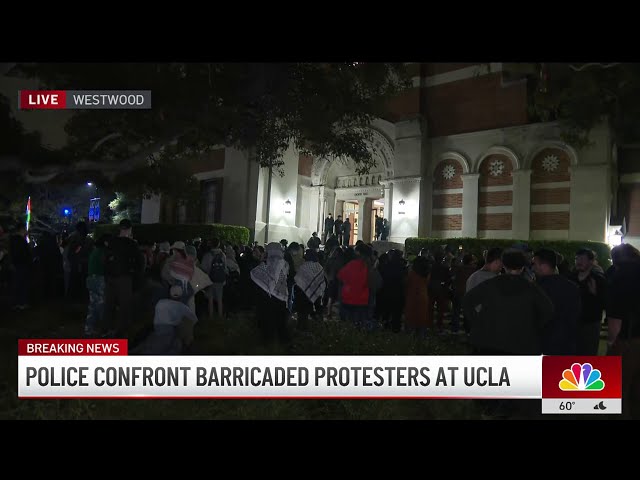 ⁣Police confront barricaded protesters at UCLA