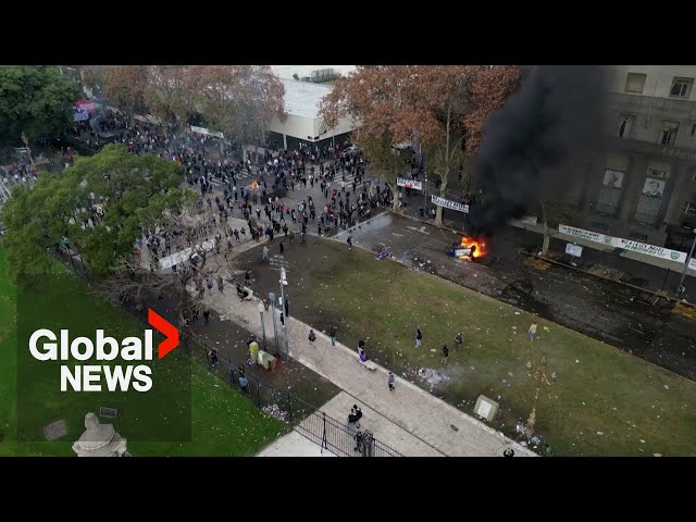 ⁣Clashes break out outside Argentina Congress as senators debate key Milei reform bill