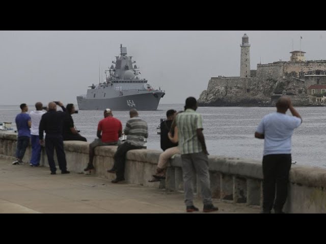 ⁣Cubans line up in Havana to board Russian military warship