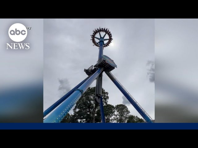 ⁣Amusement park ride leaves guests hanging upside down