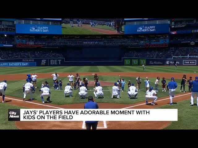 ⁣Toronto Blue Jays players have viral moment on field with kids