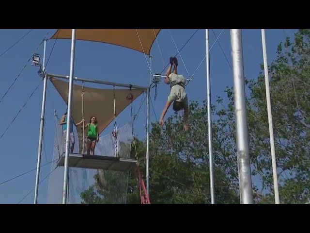 ⁣Fox 32's Gabriella Premus takes leap with Get a Grip Trapeze