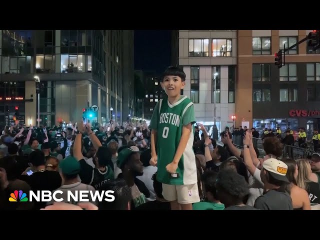 ⁣Fans flood the streets of Boston to celebrate the Celtics NBA win