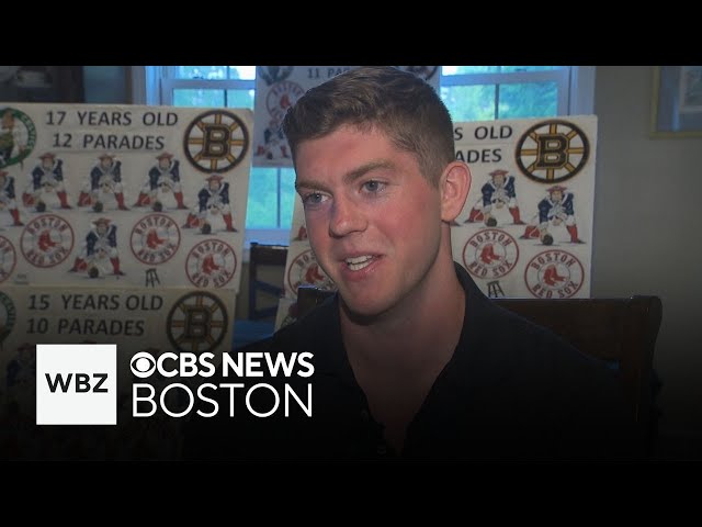 ⁣Boston "sign kid" among fans preparing for Celtics championship parade