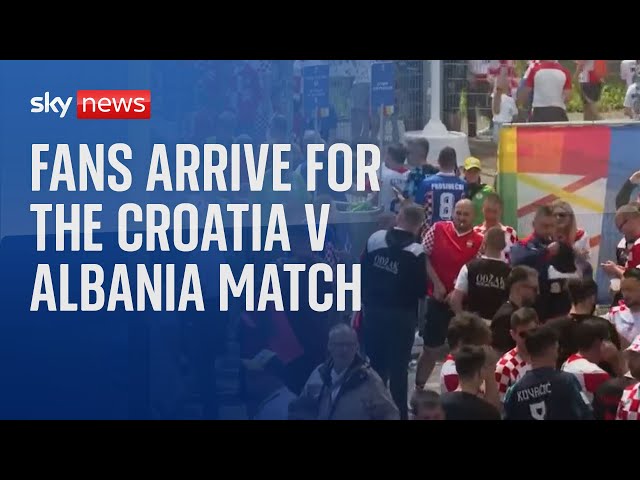 ⁣Fans arrive for Euro 2024 Croatia v Albania match outside Hamburg stadium