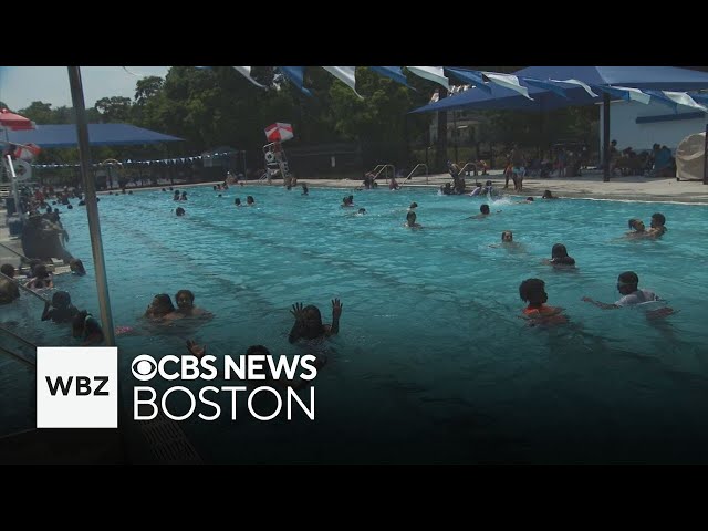 ⁣Residents pack Massachusetts beaches and pools to stay cool during first heat wave of summer