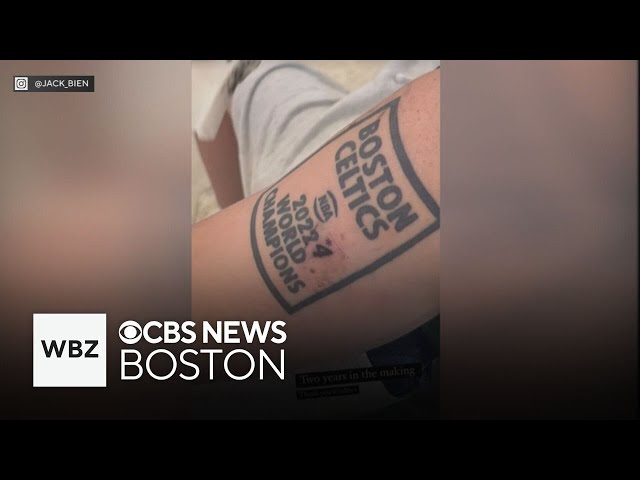⁣Boston Celtics fan amends his "2022 World Champions" tattoo