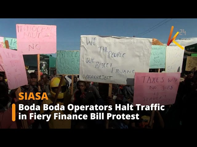 ⁣Boda boda operators block highway in fiery finance bill 2024 protest