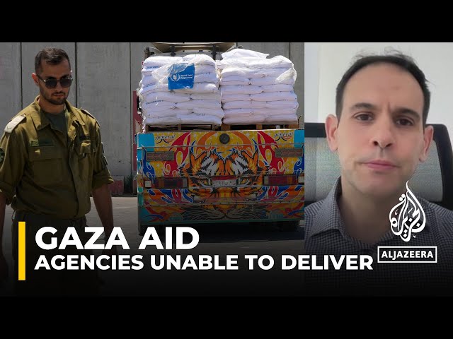 Why is aid piling up outside of Gaza?