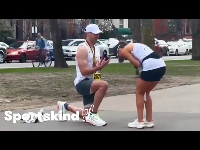 ⁣Man pops question at the iconic finish line of the Boston Marathon | Humankind