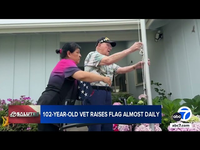 ⁣102-year-old WWII veteran still raises US flag outside his Torrance home every day