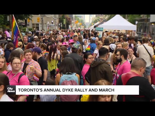 ⁣Thousands proudly flood Toronto streets for the annual Dyke March