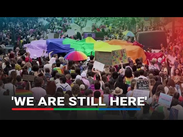 ⁣Tens of thousands march in Paris Pride ahead of elections
