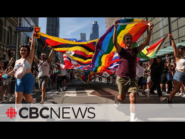 ⁣Thousands gather for Pride parade in downtown Toronto