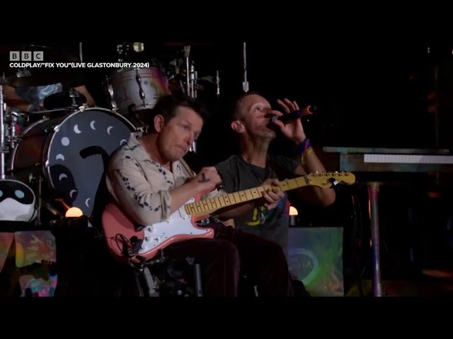 ⁣Michael J. Fox joins Coldplay on stage at Glastonbury Festival 2024
