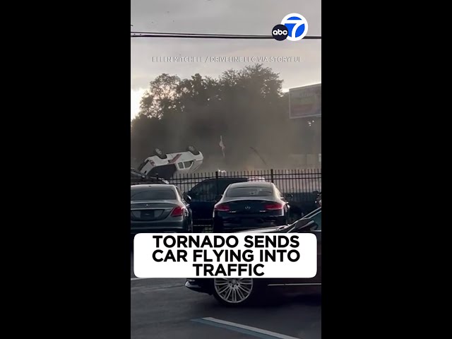 ⁣Tornado sends car flying into oncoming traffic