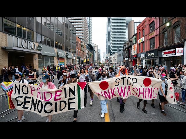 ⁣Toronto Pride parade interrupted by anti-war protesters