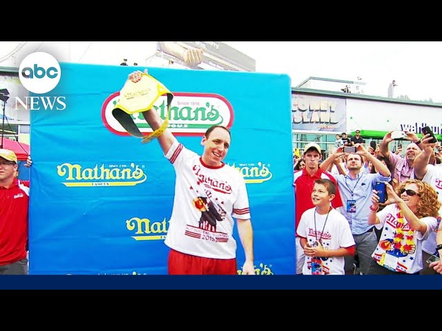 ⁣Reigning champ gets removed from Nathan's Hot Dog eating contest