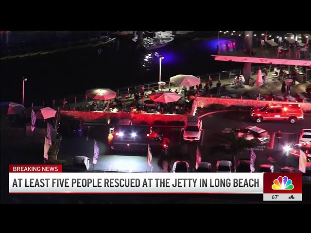 ⁣At least five people rescued at the jetty in Long Beach
