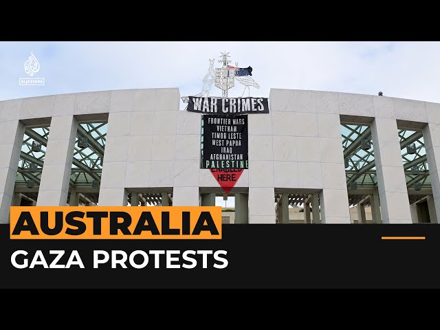 ⁣Protestors unfurl ‘war crimes’ banner on Australian parliament | Al Jazeera Newsfeed