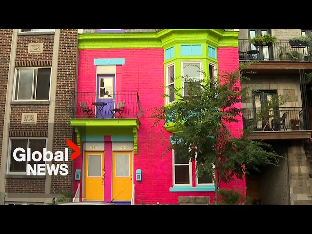 ⁣Montreal officials see red after century-old home turned into colourful billboard