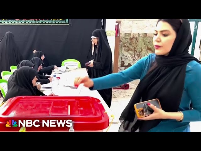 ⁣Iranians voting in a run-off presidential election