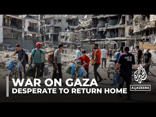 Families in Gaza City attempting to return home to collect belongings after nine months of war