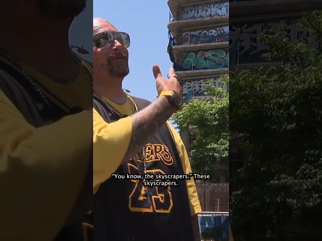 ⁣Man gets back tattoo of graffiti-filled towers in downtown LA